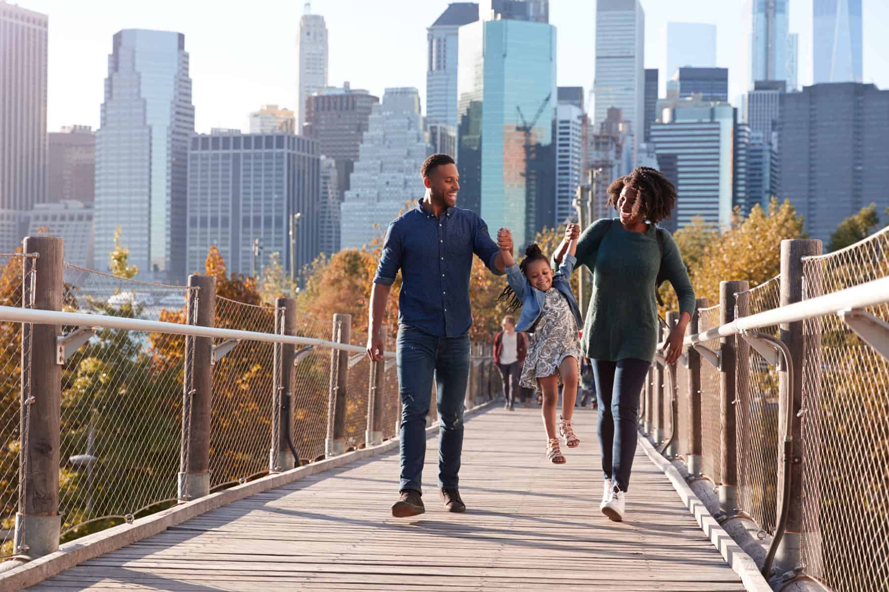 A family walking while homeschooling in NYC