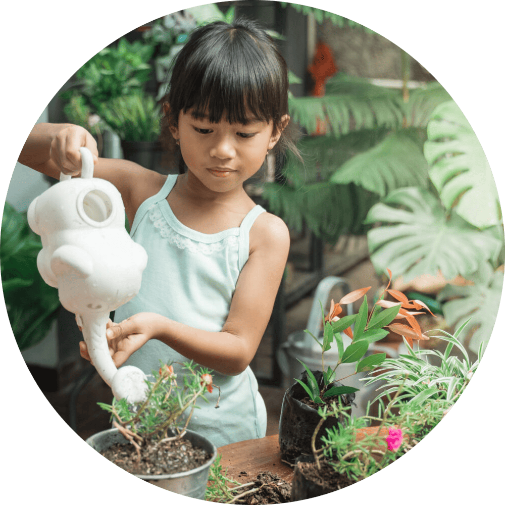 A child learning about gardening.
