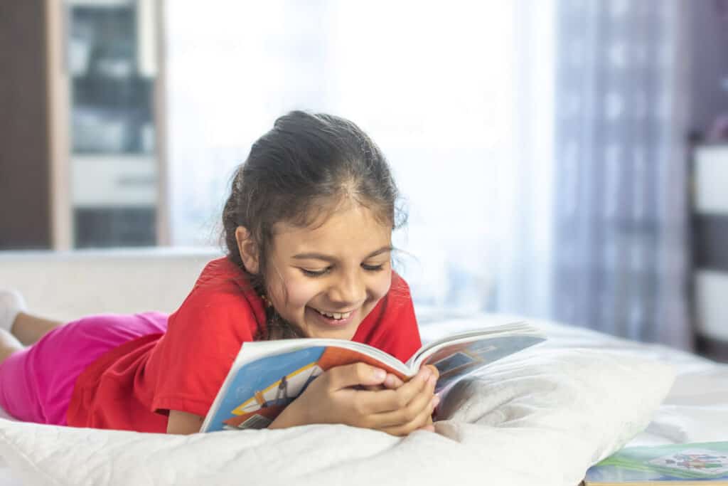 A young girl with autism learning to read