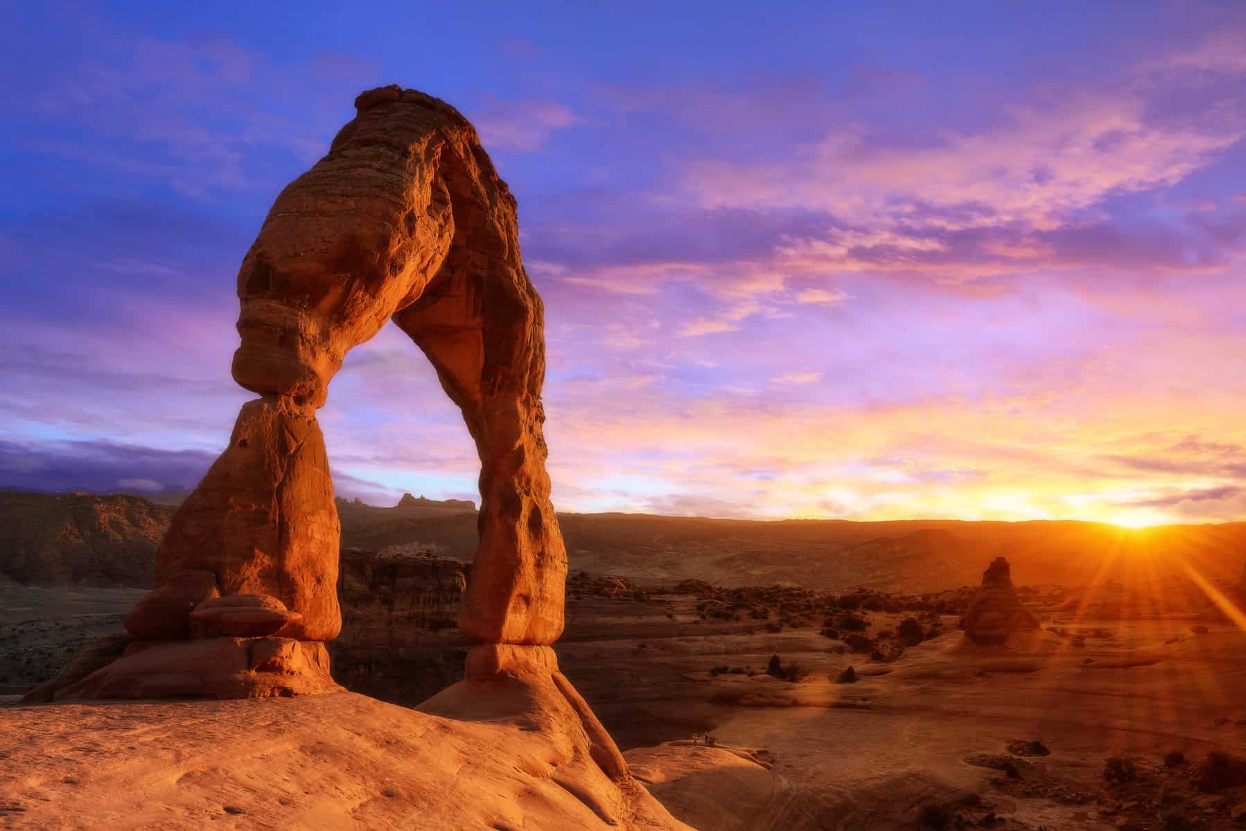 Sunset over Delicate Arch in Arches National Park, Utah