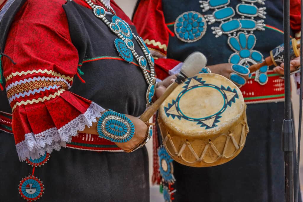 Zuni Native plays a drum in a ceremony in Gallup, New Mexico