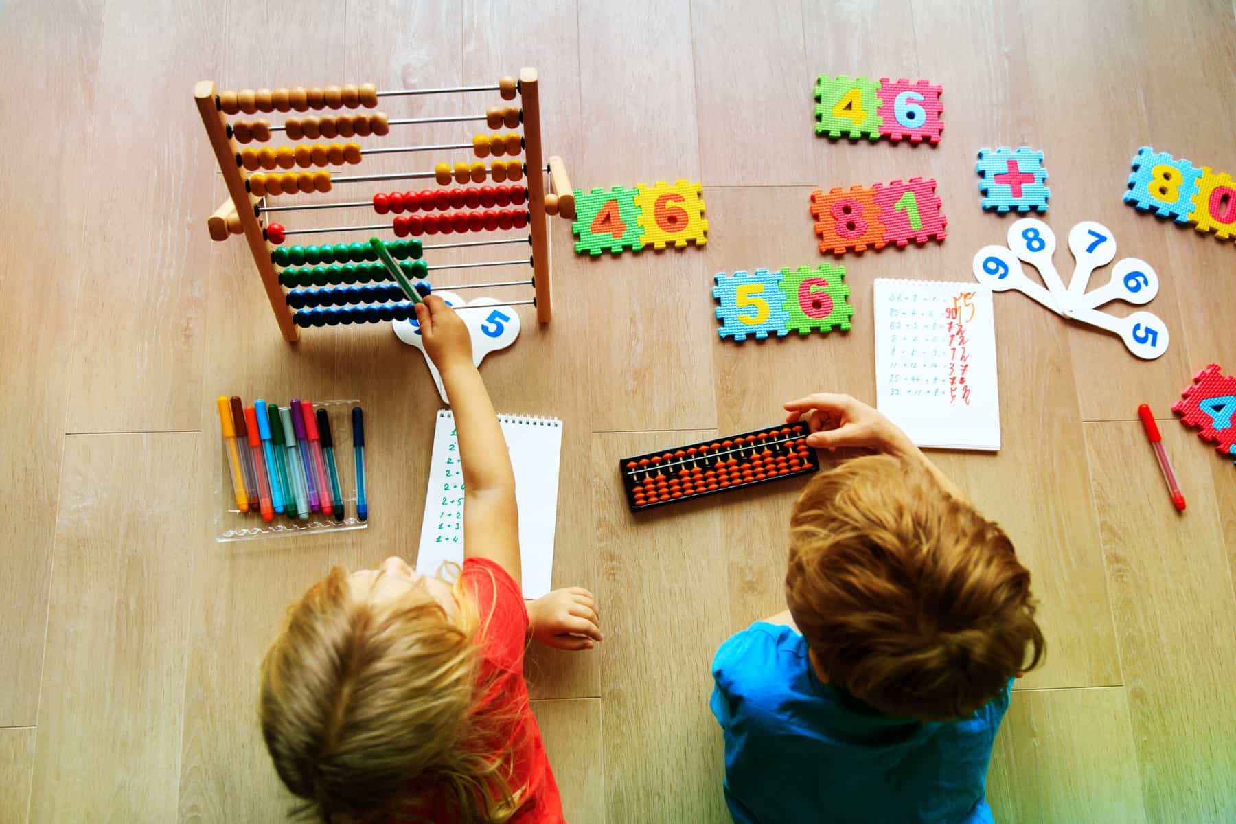 Kids playing with math toys