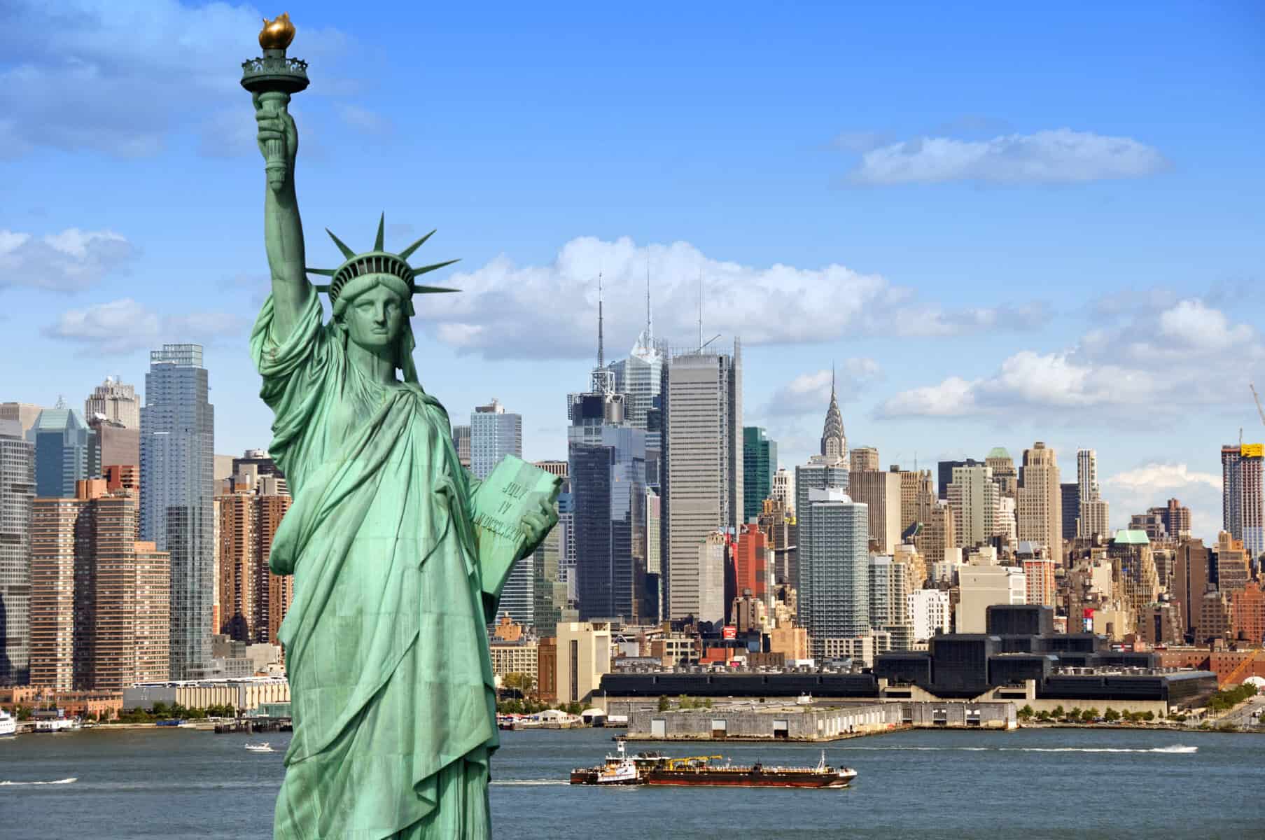 Image of the Statue of Liberty with the New York skyline in the background