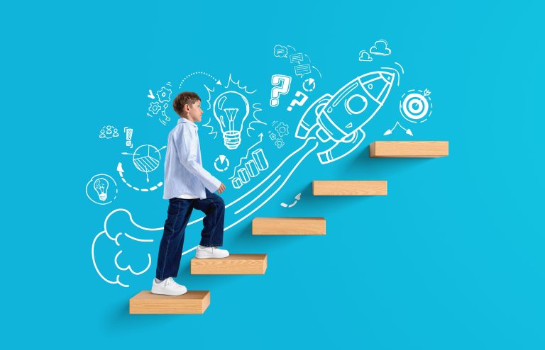 Kid on blue background going up stairs