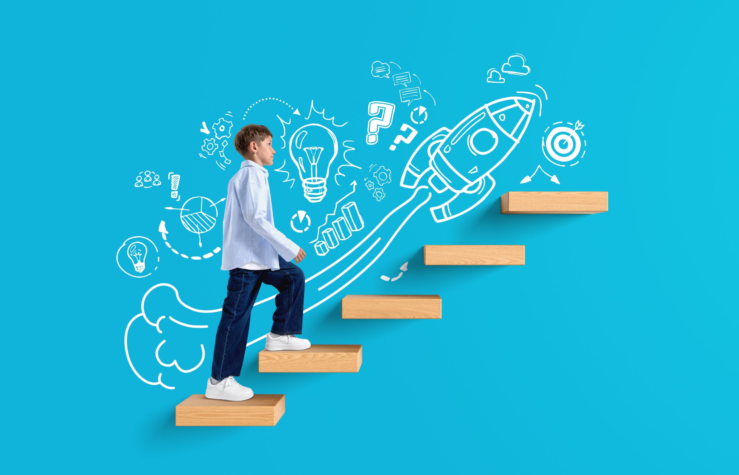 Kid on blue background going up stairs